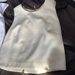 cream blouse with gold zipper